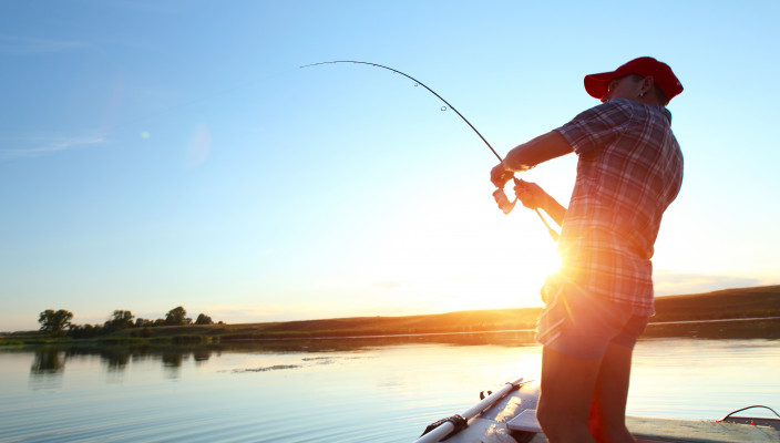 fisherman pulling in catch