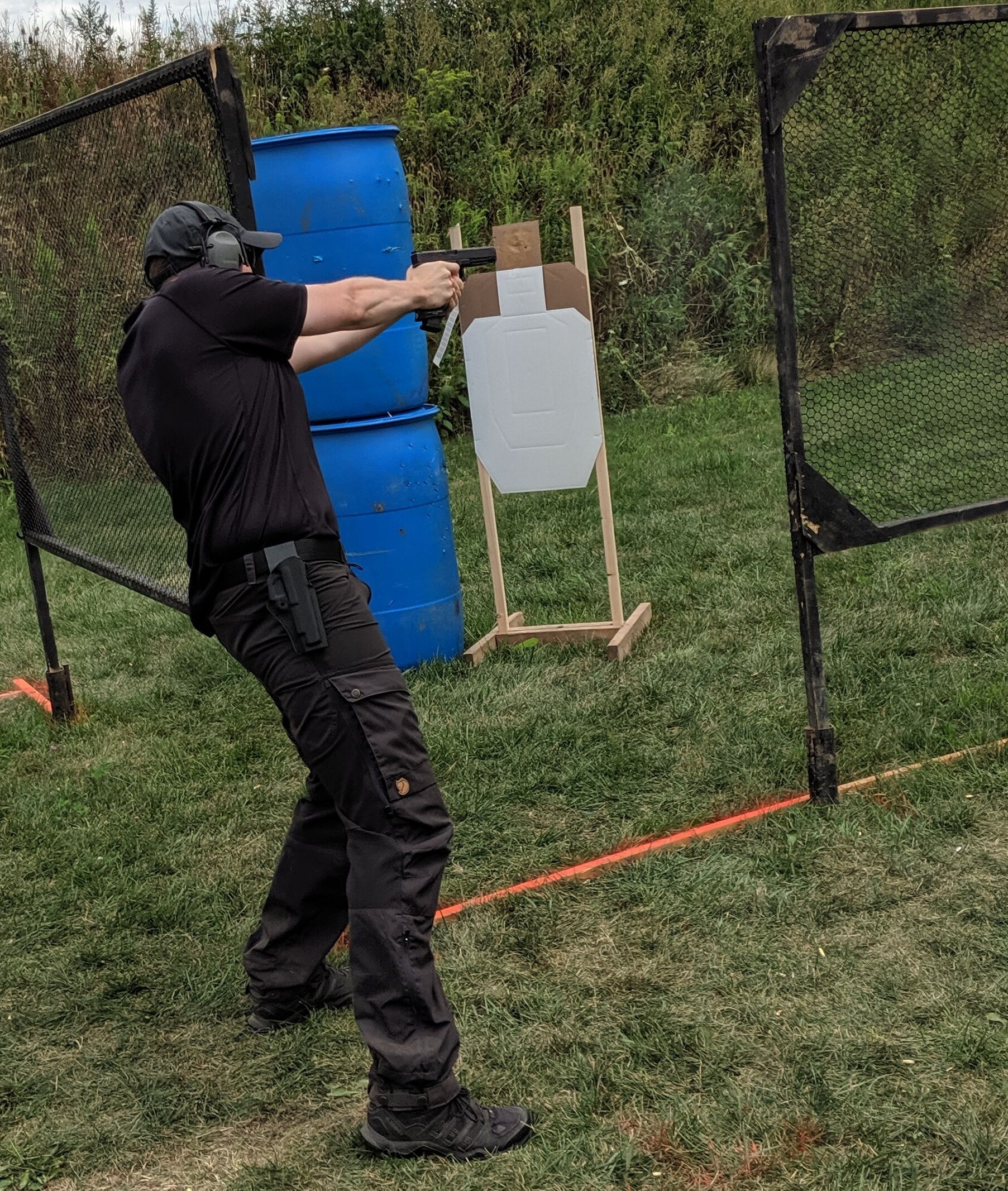 Tactical shooting practice in Fjallraven pants.