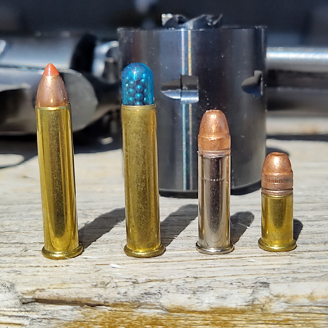 4 rimfire ammunition cartridges lined up from largest to smallest.