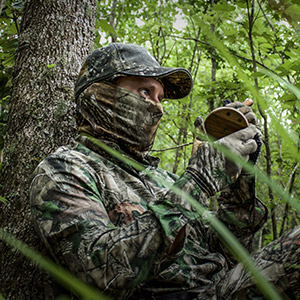 turkey hunter wearing mimicry camo